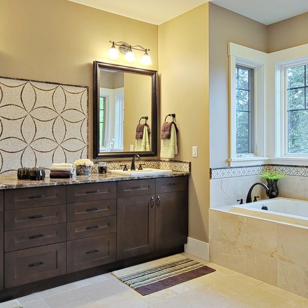 Luxury bathroom with granite countertops and flooring